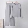 Conjunto de Dos Piezas de Punto de Color Sólido Suéter con Bolsillo de Cuello Redondo + Conjunto de Pantalones Anchos Casuales Sueltos Mujer 2026 Nueva Llegada de Principios de Otoño