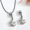 Collar de Calavera con Bola de Cristal Natural de 16 mm Hip-Hop Joyería de Moda Europea y Americana Venta al por mayor Garra de Calavera Popular para Hombres y Mujeres