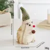 Decoraciones de mesa navideñas de espuma transfronterizas con hojas verdes, piñas, alces rústicos, figuras de muñeco de nieve y arreglos de escena