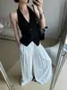 Colete de Suspensório Vermelho com Gola Halter Feminino para Verão Peça Externa Fina de Alta Qualidade Estilo Burguês Pequeno Francês Top Único Sem Costas e Sem Mangas