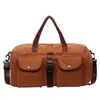 Venta al por mayor transfronteriza de bolsas de viaje tipo tote de gran capacidad, sencillas y unisex, adecuadas para el gimnasio y el yoga, con compartimentos separados para artículos húmedos y secos, ideales para equipaje de viaje
