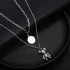 Hip hop oso explosivo extremidades móviles collar apilado de doble capa cadena de suéter larga de moda para mujer cadena de suéter con temperamento