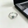 Anillo minimalista de plata pura S925 con aguamarina para mujer, gema azul verdosa en bisel redondo, superficie lisa, anillo abierto versátil