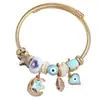 1 Pulsera Metálica Versátil de Moda con Colgantes Sencillos de Estrella, Luna, Pluma y Corazón, Accesorios Multielemento y un Diseño Único
