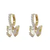Moda francesa dulce combinable con todo hebilla de oreja de concha mariposa perla para mujer exquisita ligera de lujo temperamento pendiente de alta gama venta al por mayor