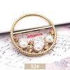 Versión coreana de hebilla de toalla de seda multifuncional al por mayor hebilla de ropa de alto nivel accesorios decorativos de pedrería de perlas hebilla de nudo de esquina