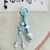 Llavero de Bolsa de Cerámica Tejida a Mano de Jingdezhen, Colgante Creativo de Anilla de Resorte, Venta al por Mayor de Pequeños Regalos Culturales y Creativos