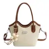 Bolso de Nicho para Mujer 2026 Nuevo Color de Primavera Bloqueo de Color Moda Tendencia de Gama Alta Bolso Cruzado de Hombro Tipo Cubo