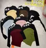 Camisa Básica Colorida Contrastante para Mulheres 2026 Primavera Novo Estilo Camiseta Irregular de Manga Longa Top Tendência e Estilosa