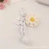 Novo Estilo Chaveiro de Girassol com Pom-Pom para Carro, Acessório de Coração de Metal Fresco e Colorido para Decoração de Bolsa Feminina