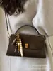 Bolsa de Mão Retrô Feminina 2025 Nova Inverno High-End Nicho Luxo Acessível Bolsa de Ombro para o Dia a Dia Transversal Pequena Quadrada