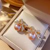 Versión coreana de aretes para mujer lazo temperamento simple tembla con el mismo estilo aretes aretes aretes fábrica mayorista aretes