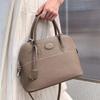 Nuevo bolso shell de piel de vaca TOGO moderno simple bandolera de mensajero color sólido cuero genuino bolso bowling para mujer