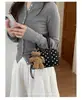 Bolso de mano de lunares de moda para mujer 2026 Nuevo de alta gama Feel Meilade para el trabajo de un solo hombro cruzado tipo Boston