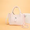 Bolso de mano transfronterizo para mujer 2026 nuevo, bolso cubo retro simple, bolso bandolera de diseño nicho para mujer
