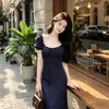Vestido de Outono com Bolinhas Estilo Francês para Mulheres 2026 Novo Verão Férias na Praia Elegante e Sofisticado Vestido Longo