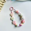 Cadena para teléfono móvil de calcio de cerdito nueva de otoño e invierno, cadena de cuentas de colores, colgante, llavero para coche, accesorios para bolsa de auriculares