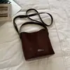 Bolso cubeta de gamuza retro de color liso, estilo coreano, nicho, ins, nuevo de otoño 2026, bandolera minimalista Maillard