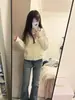 Jeans acampanados de tiro bajo de alta calle americanos para mujer, nuevo estilo de verano, diseño moderno, nicho, corte ajustado, versátiles, elásticos