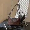 Bolsa de ombro de nicho estilo coreano transfronteiriça, nova moda outono 2026, bolsa de mão moderna, bolsa transversal para o dia a dia