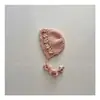 Gorro de lana tejido a mano con diseño calado, nuevo para otoño e invierno 2026, para niños y niñas, con cordón para protección de orejas y borlas lindas