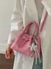 Bolso tipo cubo de moda transfronterizo estilo coreano para mujer, nuevo modelo de verano 2026, bolso de mano de alto valor, bolso pequeño de hombro y cruzado