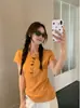 Camiseta de Manga Corta con Botones de Cuerno Texturizados Estilo Coreano para Mujer, Nueva de Verano, Ajuste Delgado, Diseño Favorecedor, Top Versátil
