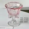 Taza alta con lazo rosa, copa de vino tinto de alto valor, copa de champán, copa de cóctel, taza de café