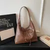 Bolsas de Alta Gama para Mujer 2026 Primavera Nuevo Estilo Versátil Retro Diseño de Nicho Bolso de Hombro Bolso Tote de Gran Capacidad