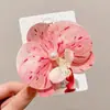 Atmósfera de Primavera Estilo Resort Costero Accesorios de Pasador de Flor de Orquídea Mariposa Simulada 2025 Nueva Diadema para Mujer