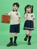 Uniforme Escolar para Estudiantes que se Gradúan de Primaria Verano Estilo Inglés Uniforme de Jardín de Infancia Primavera y Otoño Uniforme de Béisbol de Cuatro Piezas Uniforme de Clase de Deportes