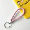 Llavero creativo llavero de cuerda de cuero cordón para llaves colgante de joyería cordón tejido fábrica de cuerda de cuero venta al por mayor