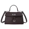Bolsa feminina vintage de nicho de alta qualidade, nova bolsa transversal casual de outono 2026, bolsa de mão quadrada pequena super popular