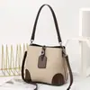 Bolso cubo bicolor 2026 nuevo modelo para ir al trabajo de cuero genuino para mujer, moderno y sofisticado, bolso versátil de hombro y cruzado 9816