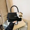 Bolso Pequeño Cuadrado Retro Estilo Hong Kong Hombro Único 2026 Nuevo de Moda Diseño de Nicho Moda Color Sólido Bolso de Hombro Cruzado de Alta Gama