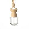 Tapa de botella de madera de Amazon con adornos de cordón, botella de aromaterapia, botella de perfume de vidrio vacía, botella de perfume creativa para coche