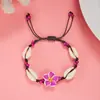 Directo de fábrica moda pequeña fresca flor de arcilla blanda concha pulsera tejida femenina joker cuerda de mano tejida a mano venta al por mayor