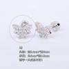 Pendientes de acero de titanio 316L chapados en oro con microincrustaciones de circonio y forma de libélula con forma de mariposa y perforación transfronteriza.