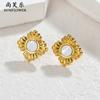Pendientes de mujer de acero de titanio con diseño de flor de cuatro pétalos, sencillos y modernos, con un nuevo estilo transfronterizo. Exquisitos pendientes pequeños y modernos.