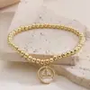 Aogu Producto Nuevo Transfronterizo Simple y Único Cobre Chapado en Oro de 18 Quilates Zircón Concha Blanca Corazón Geométrico Colgante Pulsera de Perlas