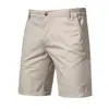 Novos shorts casuais de algodão de verão transfronteiriços para homens, estilo europeu e americano, shorts retos de corte justo no joelho, roupa de trabalho masculina de cor sólida, comércio exterior