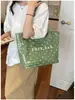Bolsa de ombro única feminina design de nicho senso de estilo couro macio bolsa feminina grande capacidade para o dia a dia temperamento bolsa tote simples feminina transfronteiriça