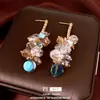 Brincos de prata com agulha europeus e americanos transfronteiriços com diamantes e zircônia, brincos de franja, brincos de nicho de alta qualidade, acessórios versáteis para vestidos de noite para mulheres