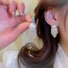 Aretes de Perlas Falsas Estilo Lujo Ligero, Modernos y Versátiles, Aretes de Celebridad de Internet en Tendencia 2025, Venta al por Mayor desde Yiwu