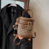 Bolso pequeño a cuadros para mujer, otoño e invierno 2025, nuevo bolso bandolera de moda que combina con todo, bolso bandolera portátil de nicho.