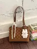 Bolso de axila grande de estilo coreano transfronterizo para mujer, nuevo modelo primavera 2026, bolso de hombro estampado simple, bolso tote para el trabajo