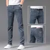 Jeans reto solto de luxo leve para homens, novo jeans de alta qualidade com stretch para primavera-verão 2026, jeans com orelha vermelha