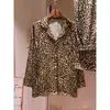Pijama de seda helada con estampado de leopardo de lujo ligero estilo francés para mujer, nuevo conjunto de ropa para el hogar de satén de manga larga y pantalón largo, verano 2026
