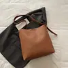 Bolsa Balde de Grande Capacidade Bolsa Feminina Moda Retrô Versátil Bolsa de Ombro Transversal Outono Nicho Bolsa Tote de Alta Qualidade