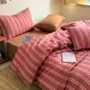 Set de Cuatro Piezas de Algodón Lavado Estilo Nuevo 2026 Sábana Nórdica y Funda de Edredón para Estudiantes de Dormitorio en la Temporada de Regreso a Clases, Lavable a Máquina